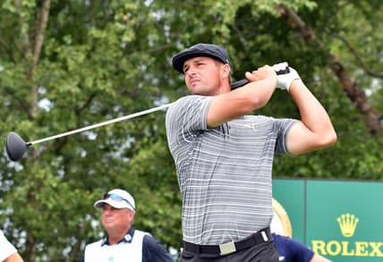Aug 20, 2021; Jersey City, New Jersey, USA; Bryson DeChambeau watches his tee shot on the 17th hole during the second round of The Northern Trust golf tournament at the Liberty National Golf Club. Mandatory Credit: Mark Konezny-USA TODAY Sports