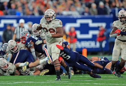 Dec 11, 2021; East Rutherford, New Jersey, USA; Army Black Knights running back Jakobi Buchanan (33) carries the ball against the Navy Midshipmen during the second half of the 122nd Army-Navy game. Mandatory Credit: Danny Wild-USA TODAY Sports