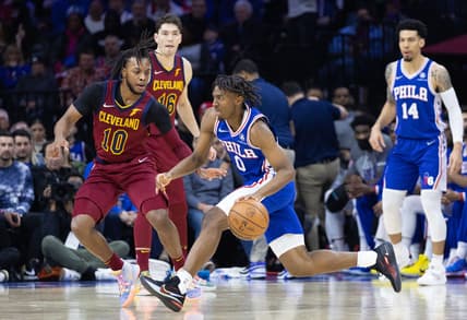 Mar 4, 2022; Philadelphia, Pennsylvania, USA; Philadelphia 76ers guard Tyrese Maxey (0) drives against Cleveland Cavaliers guard Tim Frazier (10) during the second quarter at Wells Fargo Center. Mandatory Credit: Bill Streicher-USA TODAY Sports