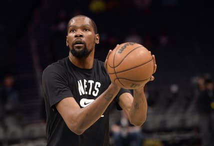 Mar 8, 2022; Charlotte, North Carolina, USA;  Brooklyn Nets forward Kevin Durant (7) warms up before the game against the Charlotte Hornets at the Spectrum Center. Mandatory Credit: Sam Sharpe-USA TODAY Sports