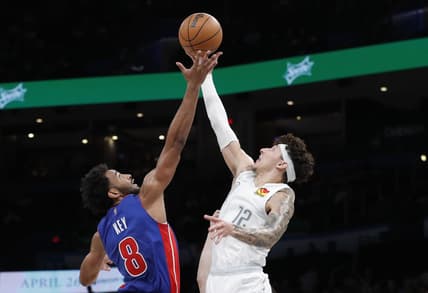 Apr 1, 2022; Oklahoma City, Oklahoma, USA; Detroit Pistons forward Braxton Key (8) and Oklahoma City Thunder forward Lindy Waters III (12) reach for a jump ball during the second quarter at Paycom Center. Mandatory Credit: Alonzo Adams-USA TODAY Sports