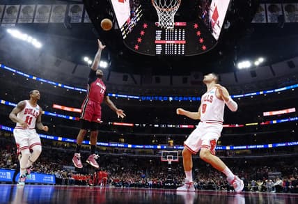 Apr 2, 2022; Chicago, Illinois, USA; Miami Heat forward P.J. Tucker (17) shoots the ball against the Chicago Bulls during the first half at United Center. Mandatory Credit: David Banks-USA TODAY Sports