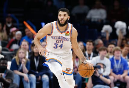 Feb 9, 2022; Oklahoma City, Oklahoma, USA; Oklahoma City Thunder forward Kenrich Williams (34) dribbles the ball down the court against the Toronto Raptors during the second half at Paycom Center. Toronto won 117-98. Mandatory Credit: Alonzo Adams-USA TODAY Sports