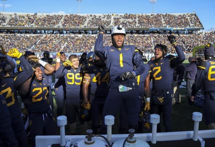 Nov 10, 2018; Morgantown, WV, USA; West Virginia Mountaineers cornerback Derrek Pitts Jr. (1) celebrates after a turnover during the fourth quarter against the TCU Horned Frogs at Mountaineer Field at Milan Puskar Stadium. Mandatory Credit: Ben Queen-USA TODAY Sports
