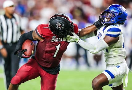 Sep 3, 2022; Columbia, South Carolina, USA; Georgia State Panthers safety Antavious Lane (34) is called for a face masking penalty on South Carolina Gamecocks running back MarShawn Lloyd (1) in the second quarter at Williams-Brice Stadium. Mandatory Credit: Jeff Blake-USA TODAY Sports