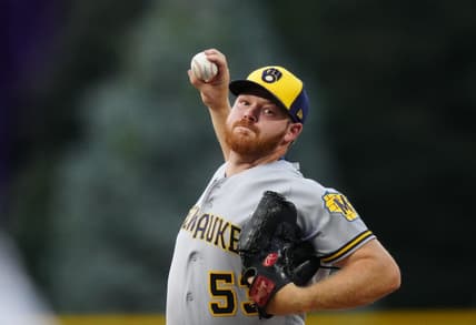 Sep 6, 2022; Denver, Colorado, USA; Milwaukee Brewers starting pitcher Brandon Woodruff (53) pitches in the first inning against the Colorado Rockies at Coors Field. Mandatory Credit: Ron Chenoy-USA TODAY Sports