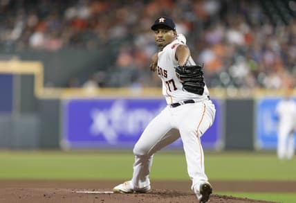 Sep 27, 2022; Houston, Texas, USA; Houston Astros starting pitcher Luis Garcia (77) pitches against the Arizona Diamondbacks in the second inning at Minute Maid Park. Mandatory Credit: Thomas Shea-USA TODAY Sports