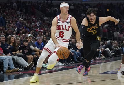 Oct 22, 2022; Chicago, Illinois, USA; Cleveland Cavaliers forward Cedi Osman (16) defends Chicago Bulls guard Alex Caruso (6) during the first quarter at United Center. Mandatory Credit: David Banks-USA TODAY Sports