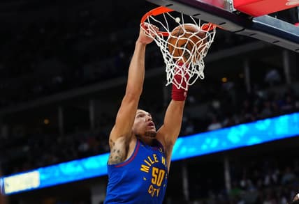 Oct 22, 2022; Denver, Colorado, USA; Denver Nuggets forward Aaron Gordon (50) dunks in the second quarter against the Oklahoma City Thunder at Ball Arena. Mandatory Credit: Ron Chenoy-USA TODAY Sports