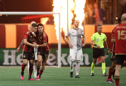 Mar 4, 2023; Atlanta, Georgia, USA; Atlanta United midfielder Matheus Rossetto (20) celebrates with teammates after scoring a goal against the Toronto FC during the second half at Mercedes-Benz Stadium. Mandatory Credit: Brett Davis-USA TODAY Sports
