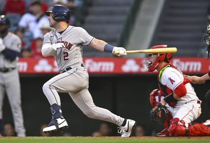 May 8, 2023; Anaheim, California, USA;  Houston Astros third baseman Alex Bregman (2) hits a RBI triple in the third inning against the Los Angeles Angels at Angel Stadium. Mandatory Credit: Jayne Kamin-Oncea-USA TODAY Sports