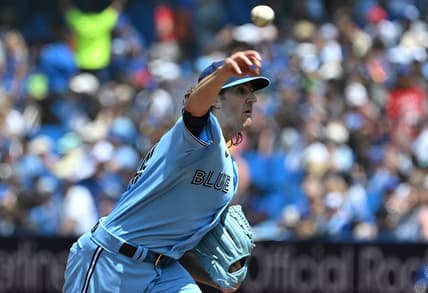 Jun 1, 2023; Toronto, Ontario, CAN;   Toronto Blue Jays starting pitcher Kevin Gausman (34) delivers a pitch against the Milwaukee Brewers in the first inning at Rogers Centre. Mandatory Credit: Dan Hamilton-USA TODAY Sports