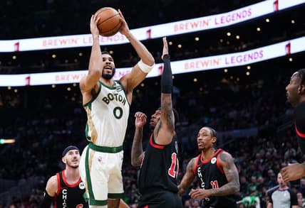 Nov 28, 2023; Boston, Massachusetts, USA; Boston Celtics forward Jayson Tatum (0) shoots against Chicago Bulls forward Torrey Craig (13) in the first quarter at TD Garden. Mandatory Credit: David Butler II-USA TODAY Sports
