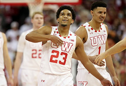 Feb 20, 2022; Madison, Wisconsin, USA; Wisconsin Badgers guard Chucky Hepburn (23) celebrates a three point basket in the game with the Michigan Wolverines at the Kohl Center. Mandatory Credit: Mary Langenfeld-USA TODAY Sports