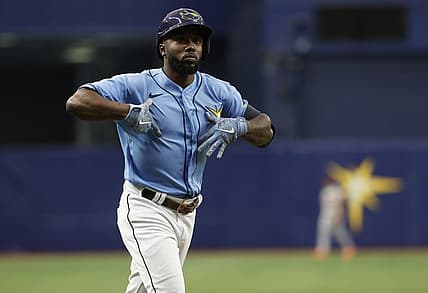 Jul 17, 2022; St. Petersburg, Florida, USA; Tampa Bay Rays left fielder Randy Arozarena (56) celebrates after he hits a two-run home run against the Baltimore Orioles during the first inning at Tropicana Field. Mandatory Credit: Kim Klement-USA TODAY Sports