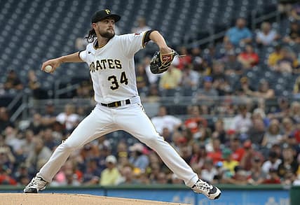 Aug 18, 2022; Pittsburgh, Pennsylvania, USA;  Pittsburgh Pirates starting pitcher JT Brubaker (34) delivers a pitch against the Boston Red Sox during the first inning at PNC Park. Mandatory Credit: Charles LeClaire-USA TODAY Sports