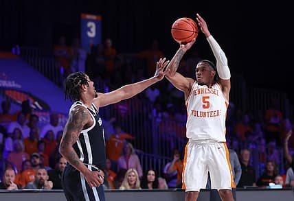 Nov 23, 2022; Paradise Island, BAHAMAS; Tennessee Volunteers guard Zakai Zeigler (5) shoots over Butler Bulldogs forward D.J. Hughes (0) during the first half at Imperial Arena. Mandatory Credit: Kevin Jairaj-USA TODAY Sports
