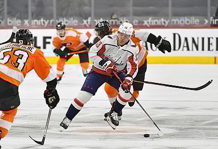Mar 7, 2021; Philadelphia, Pennsylvania, USA; Washington Capitals left wing Jakub Vrana (13) carries the puck into Philadelphia Flyers zone during the first period at Wells Fargo Center. Mandatory Credit: Eric Hartline-USA TODAY Sports