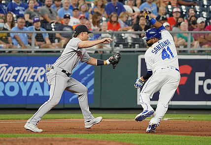 Aug 16, 2021; Kansas City, Missouri, USA; Houston Astros third baseman Aledmys Diaz (16) tags out Kansas City Royals first baseman Carlos Santana (41) in a rundown between second and third base in the fifth inning at Kauffman Stadium. Mandatory Credit: Denny Medley-USA TODAY Sports