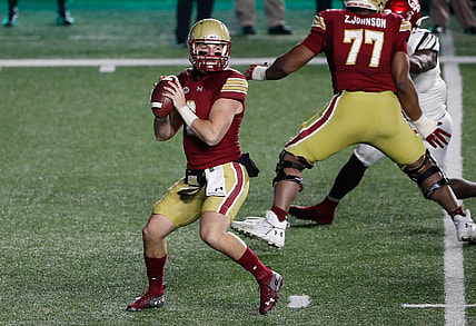 Nov 28, 2020; Chestnut Hill, Massachusetts, USA; Boston College Eagles quarterback Dennis Grosel (6) looks to pass against the Louisville Cardinals during the second half at Alumni Stadium. Mandatory Credit: Winslow Townson-USA TODAY Sports
