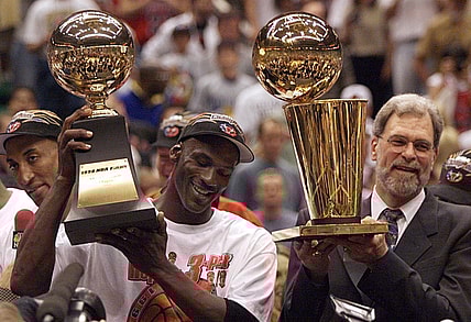 Michael Jordan and Phil Jackson celebrate after finishing off the Jazz to win the 1998 championship.

2020-04-16 Jordan Jackson