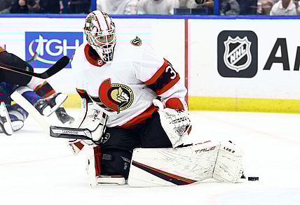 Mar 1, 2022; Tampa, Florida, USA; Ottawa Senators goaltender Matt Murray (30) makes a save against the Tampa Bay Lightning during the first period at Amalie Arena. Mandatory Credit: Kim Klement-USA TODAY Sports