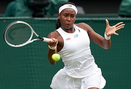 Jul 5, 2021; London, United Kingdom;  Coco Gauff (USA) seen playing Angelique Kerber (GER) on the Centre court in the ladies fourth round at All England Lawn Tennis and Croquet Club. Mandatory Credit: Peter van den Berg-USA TODAY Sports