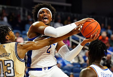 Mar 8, 2023; Greensboro, NC, USA; Pittsburgh Panthers forward Blake Hinson (2) drives to the basket against Georgia Tech Yellow Jackets guard Miles Kelly (13)  during the first half of the second round of the ACC tournament at Greensboro Coliseum. Mandatory Credit: John David Mercer-USA TODAY Sports