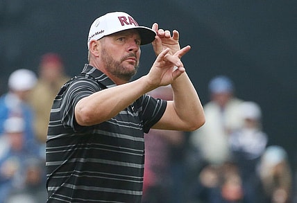 Michael Block tips his hat and waves to the loud supportive crowd following his par on the 18th hole during the third round at the PGA Championship at Oak Hill Country Club Saturday, May 20, 2023.  Block finished the day tied for eighth at even par.
