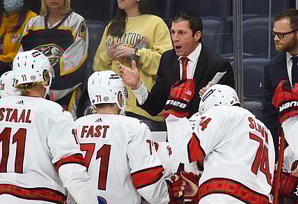 Oct 16, 2021; Nashville, Tennessee, USA; Carolina Hurricanes head coach Rod Brind'Amour talks during a timeout during the third period against the Nashville Predators at Bridgestone Arena. Mandatory Credit: Christopher Hanewinckel-USA TODAY Sports