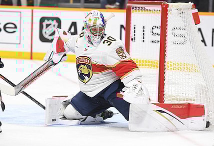 Feb 18, 2023; Nashville, Tennessee, USA; Florida Panthers goaltender Spencer Knight (30) makes a save during the third period against the Nashville Predators at Bridgestone Arena. Mandatory Credit: Christopher Hanewinckel-USA TODAY Sports