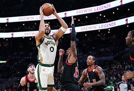 Nov 28, 2023; Boston, Massachusetts, USA; Boston Celtics forward Jayson Tatum (0) shoots against Chicago Bulls forward Torrey Craig (13) in the first quarter at TD Garden. Mandatory Credit: David Butler II-USA TODAY Sports