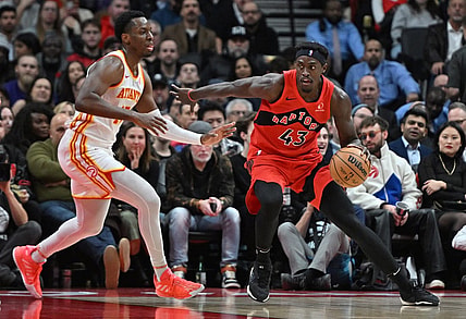Dec 13, 2023; Toronto, Ontario, CAN;   Toronto Raptors forward Pascal Siakam (43) dribbles the ball as Atlanta Hawks forward Onyeka Okongwu (17) defends in the first half at Scotiabank Arena. Mandatory Credit: Dan Hamilton-USA TODAY Sports