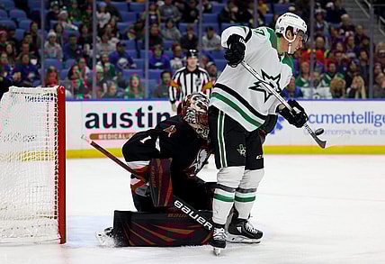 Feb 6, 2024; Buffalo, New York, USA;  Dallas Stars left wing Mason Marchment (27) deflects a shot on Buffalo Sabres goaltender Ukko-Pekka Luukkonen (1) during the third period at KeyBank Center. Mandatory Credit: Timothy T. Ludwig-USA TODAY Sports