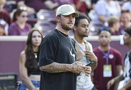 Sep 16, 2023; College Station, Texas, USA; Former Texas A&M Aggies player Johnny Manziel watches from the sideline during the first half of the game between the Aggies and the Louisiana Monroe Warhawks at Kyle Field. Mandatory Credit: Troy Taormina-USA TODAY Sports