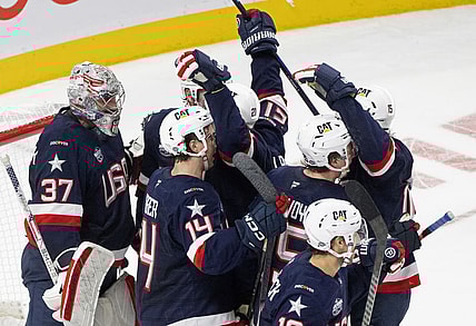 United States players celebrates their win over Canada following third period 4 Nations Face-Off hockey game in Montreal on Saturday, Feb. 15, 2025. (Christinne Muschi/The Canadian Press via AP)