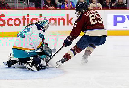 New York Sirens goalie Kayle Osborne denies Montreal Victoire forward Lina Ljungblom.