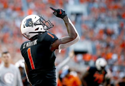 Sep 25, 2021; Stillwater, Oklahoma, USA;  Oklahoma State Cowboys wide receiver Tay Martin (1) celebrates after catching a touchdown pass against the Kansas State Wildcats in the second quarter at Boone Pickens Stadium. Mandatory Credit: Sarah Phipps-USA TODAY Sports