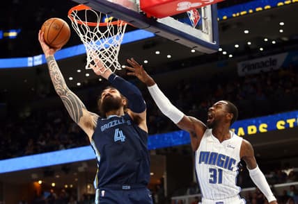 Mar 5, 2022; Memphis, Tennessee, USA; Memphis Grizzles center Steven Adams (4) dunks against Orlando Magic guard/forward Terrence Ross (31) during the first half at FedExForum. Mandatory Credit: Petre Thomas-USA TODAY Sports