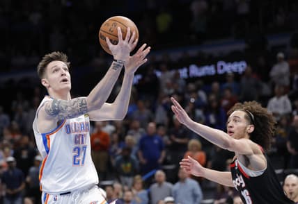 Apr 5, 2022; Oklahoma City, Oklahoma, USA; Oklahoma City Thunder guard Vit Krejci (27) goes to the basket as Portland Trail Blazers guard CJ Elleby (16) defends during the second half at Paycom Center. Oklahoma City won 98-94. Mandatory Credit: Alonzo Adams-USA TODAY Sports