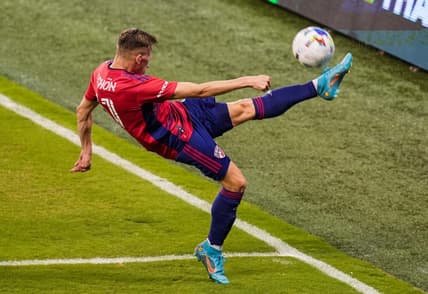 May 10, 2022; Kansas City, Kansas, USA; FC Dallas forward Szabolcs Schon (11) clears the ball during the second half against Sporting Kansas City at Children's Mercy Park. Mandatory Credit: Jay Biggerstaff-USA TODAY Sports