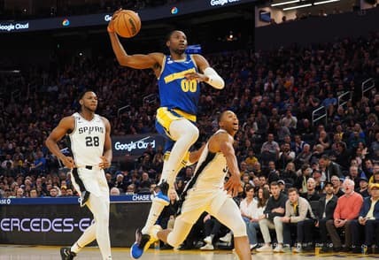 Nov 14, 2022; San Francisco, California, USA; Golden State Warriors forward Jonathan Kuminga (00) drives for a dunk against the San Antonio Spurs during the third quarter at Chase Center. Mandatory Credit: Kelley L Cox-USA TODAY Sports