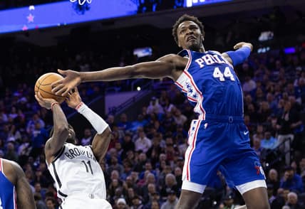 Nov 22, 2022; Philadelphia, Pennsylvania, USA; Philadelphia 76ers forward Paul Reed (44) reaches to block the shot attempt of Brooklyn Nets guard Kyrie Irving (11) during the second quarter at Wells Fargo Center. Mandatory Credit: Bill Streicher-USA TODAY Sports
