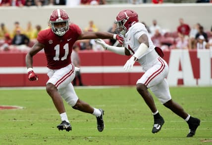 Apr 16, 2022; Tuscaloosa, Alabama, USA;  Crimson wide receiver Traeshon Holden (11) is defended by White defensive back Kool-Aid McKinstry (1) during the A-Day game at Bryant-Denny Stadium. Mandatory Credit: Gary Cosby Jr.-USA TODAY Sports