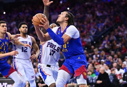 Jan 28, 2023; Philadelphia, Pennsylvania, USA; Denver Nuggets forward Aaron Gordon (50) drives against Philadelphia 76ers forward P.J. Tucker (17) in the first quarter at Wells Fargo Center. Mandatory Credit: Kyle Ross-USA TODAY Sports