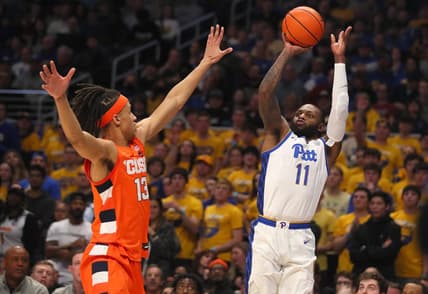 Pittsburgh Panthers guard Jamarius Burton (11) attempts a three point shot after gaining space from Syracuse Orange forward Benny Williams (13) during the first half on February 25, 2023 at the Petersen Events Center in Pittsburgh, PA.

Pittsburgh Panthers Vs Syracuse Orange Mens Basketball