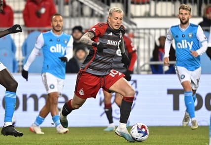 Apr 1, 2023; Toronto, Ontario, CAN;   Toronto FC forward Federico Bernardeschi (10) controls the ball against Charlotte FC in the second half at BMO Field. Mandatory Credit: Dan Hamilton-USA TODAY Sports