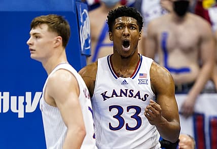 Feb 12, 2022; Lawrence, Kansas, USA; Kansas Jayhawks forward David McCormack (33) reacts during the second half against the Oklahoma Sooners at Allen Fieldhouse. Mandatory Credit: Jay Biggerstaff-USA TODAY Sports