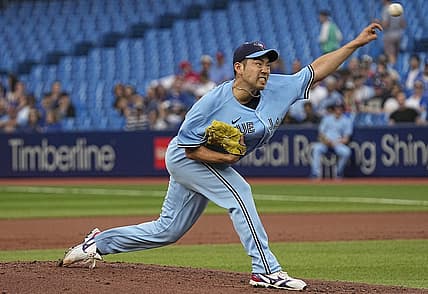 Jun 30, 2022; Toronto, Ontario, CAN; Toronto Blue Jays starting pitcher Yusei Kikuchi (16) throws a pitch to the Tampa Bay Rays during the second inning at Rogers Centre. Mandatory Credit: John E. Sokolowski-USA TODAY Sports