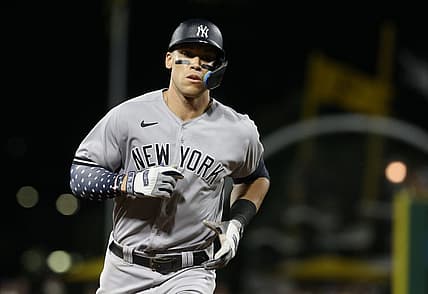 Jul 6, 2022; Pittsburgh, Pennsylvania, USA; New York Yankees center fielder Aaron Judge (99) rounds the bases after hitting a grand slam home run against the Pittsburgh Pirates during the eighth inning at PNC Park. Mandatory Credit: Charles LeClaire-USA TODAY Sports
